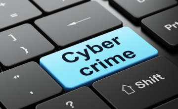Security concept: Cyber Crime on computer keyboard background